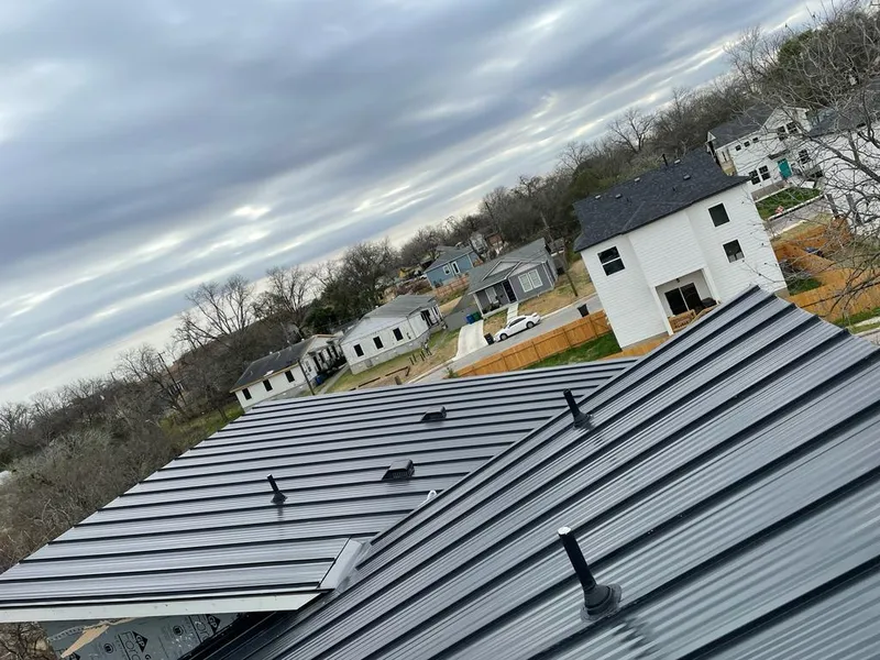 Standing seam metal roof panels with vents for Skylight Repair in Pittsford